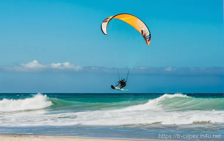 카보베르데 해양 스포츠 - **Dynamic Kitesurfing Session in Turquoise Waters**
A vibrant, high-energy image featuring a mal...